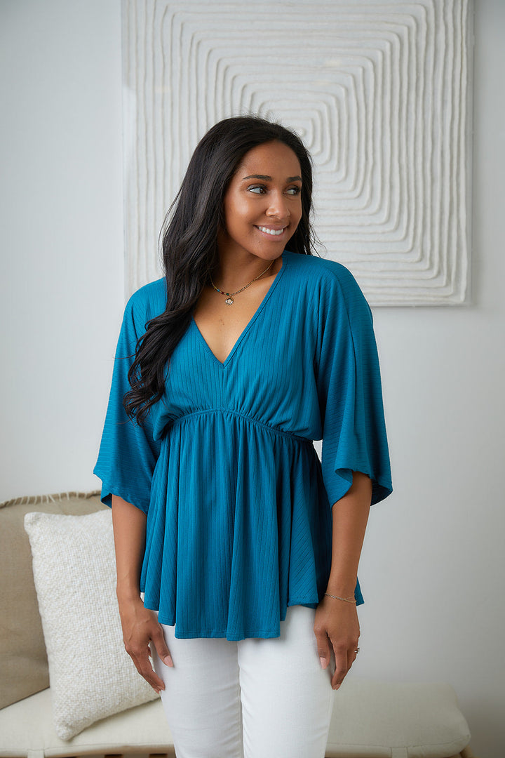 Storied Moments Draped Peplum Top in Teal!