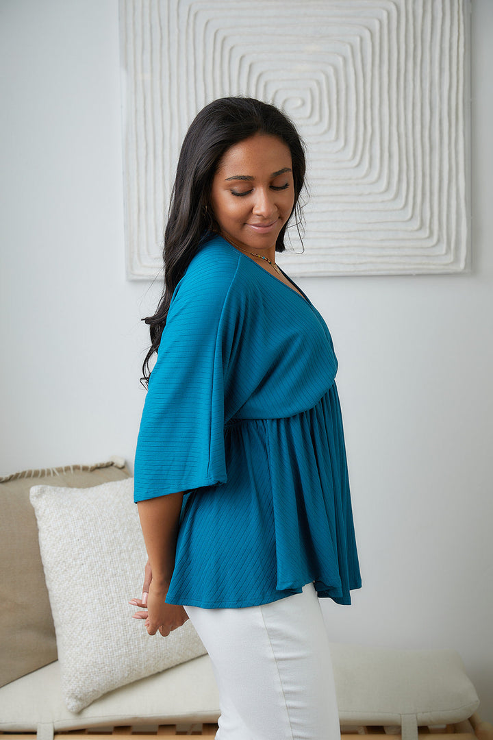 Storied Moments Draped Peplum Top in Teal!