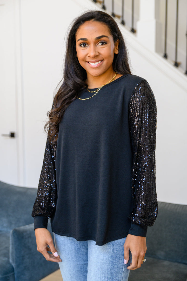 Center Of Attention Blouse In Black!