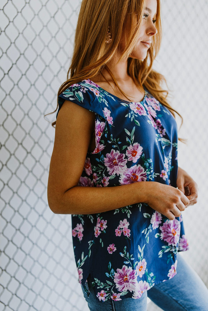 Crowd Charmer Floral Cap Sleeve Blouse!