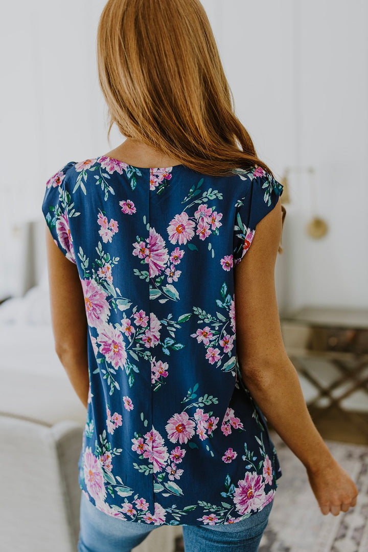 Crowd Charmer Floral Cap Sleeve Blouse!