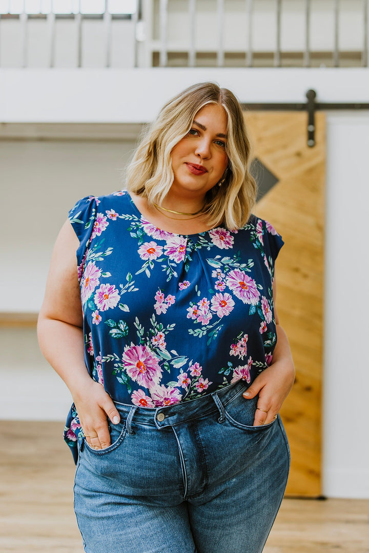 Crowd Charmer Floral Cap Sleeve Blouse!