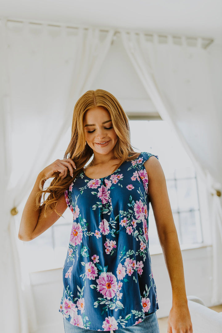 Crowd Charmer Floral Cap Sleeve Blouse!