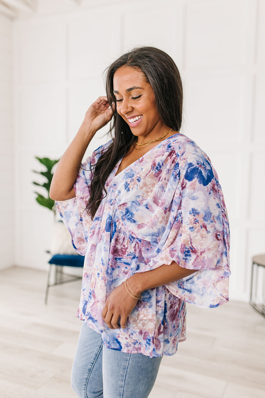 Fabled in Floral Draped Peplum Top in Blue!