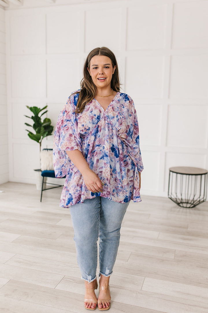 Fabled in Floral Draped Peplum Top in Blue!