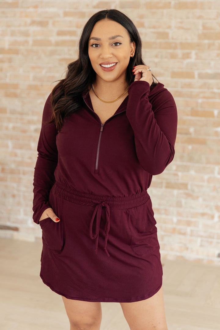 Getting Out Long Sleeve Hoodie Romper in Maroon!