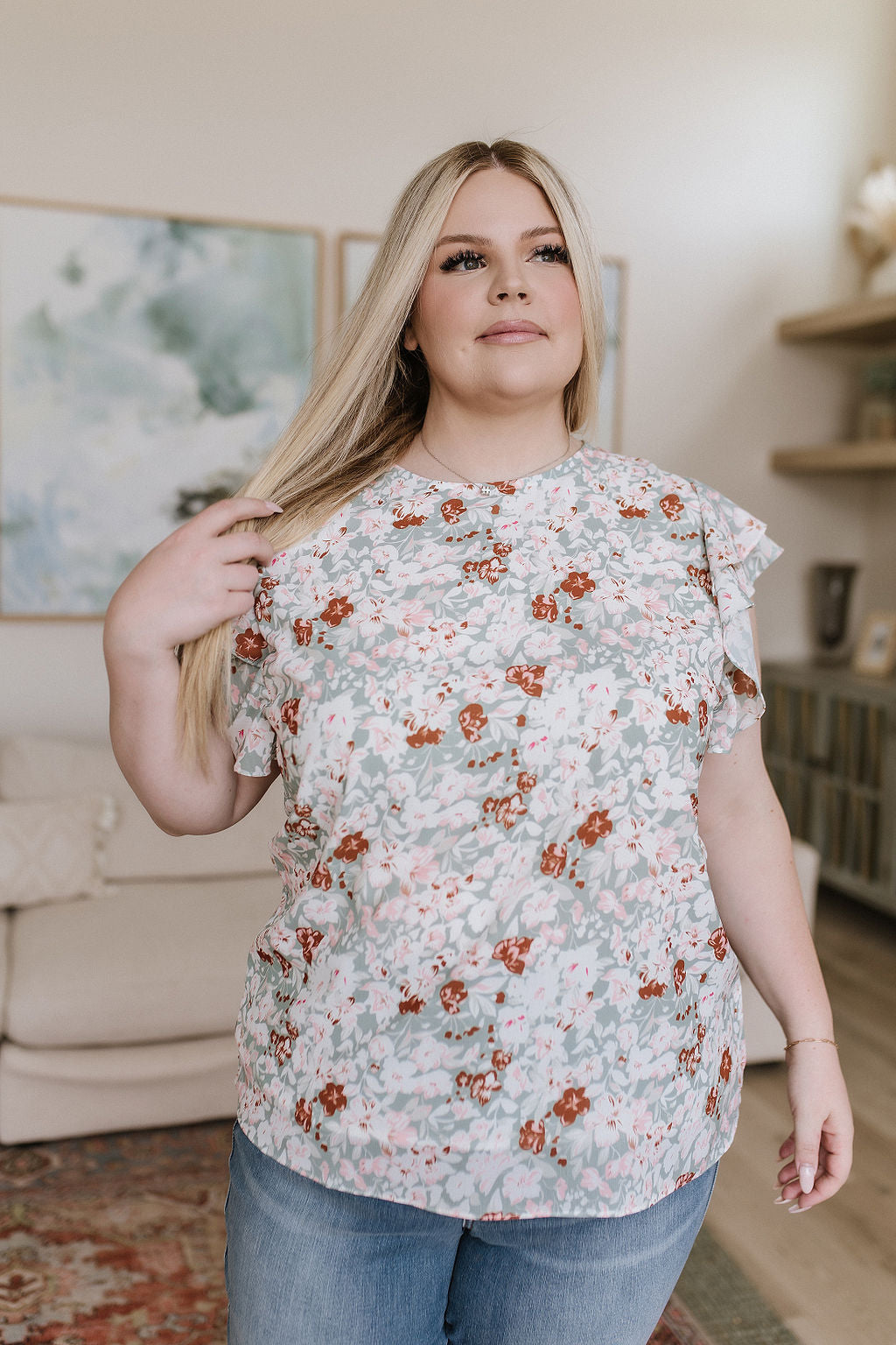 I've Got a Feeling Floral Flutter Sleeve Top!