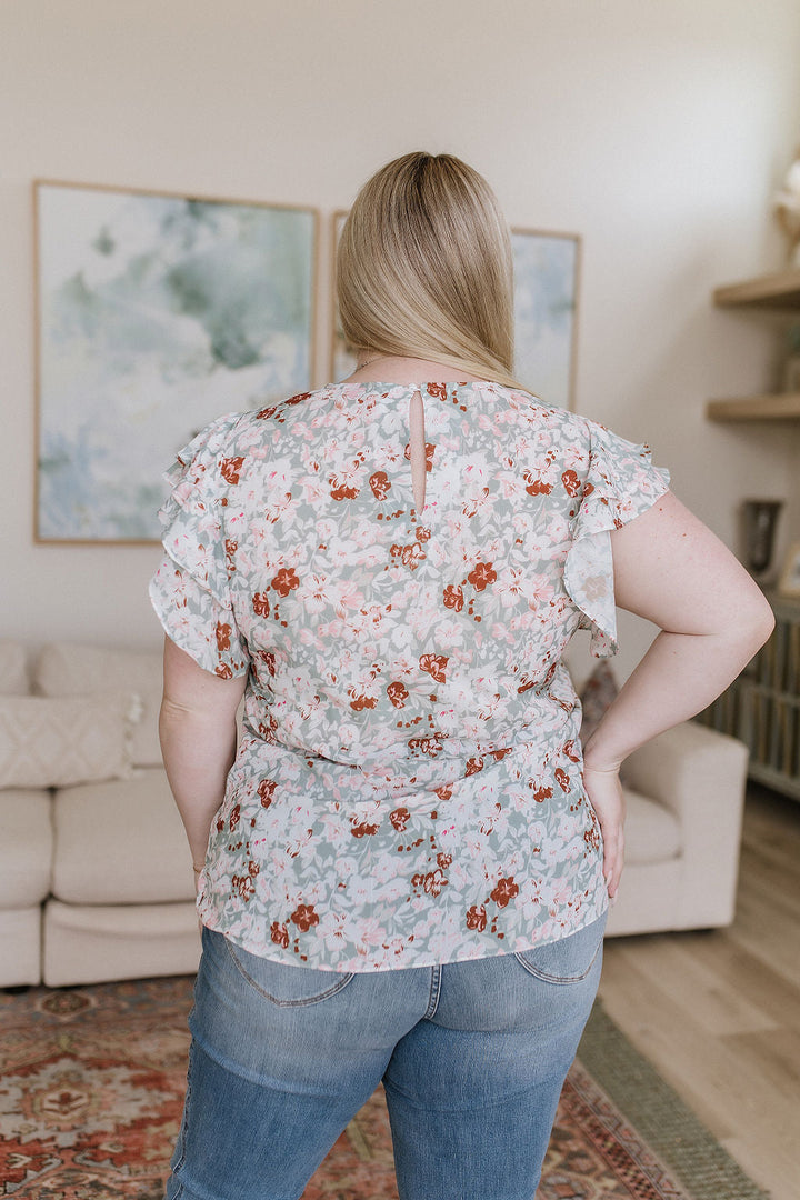 I've Got a Feeling Floral Flutter Sleeve Top!