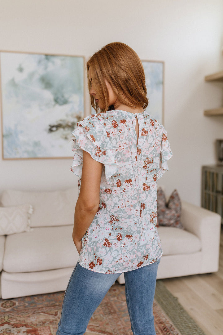 I've Got a Feeling Floral Flutter Sleeve Top!