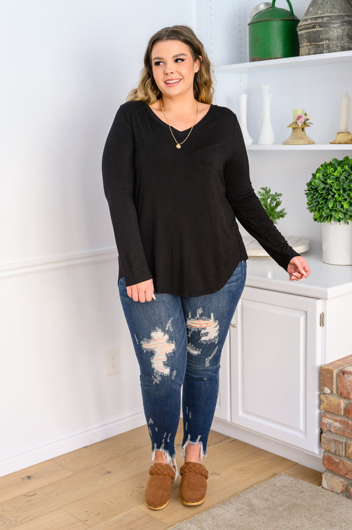 It's Your Move V Neck Long Sleeve Top In Black!