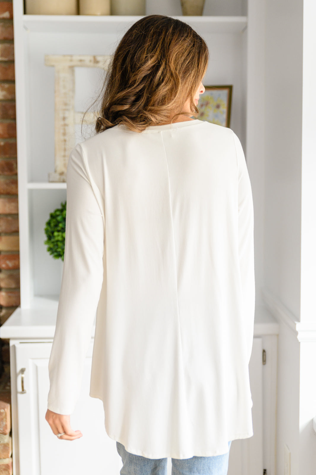 It's Your Move V Neck Long Sleeve Top In Ivory!