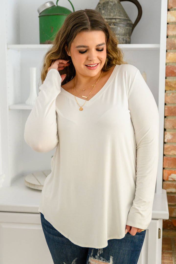 It's Your Move V Neck Long Sleeve Top In Ivory!