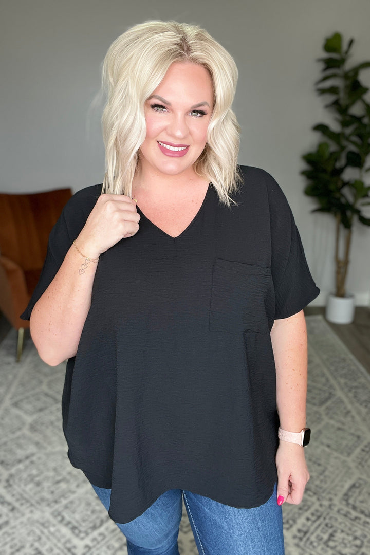 Let's Roll V-Neck Top in Black!