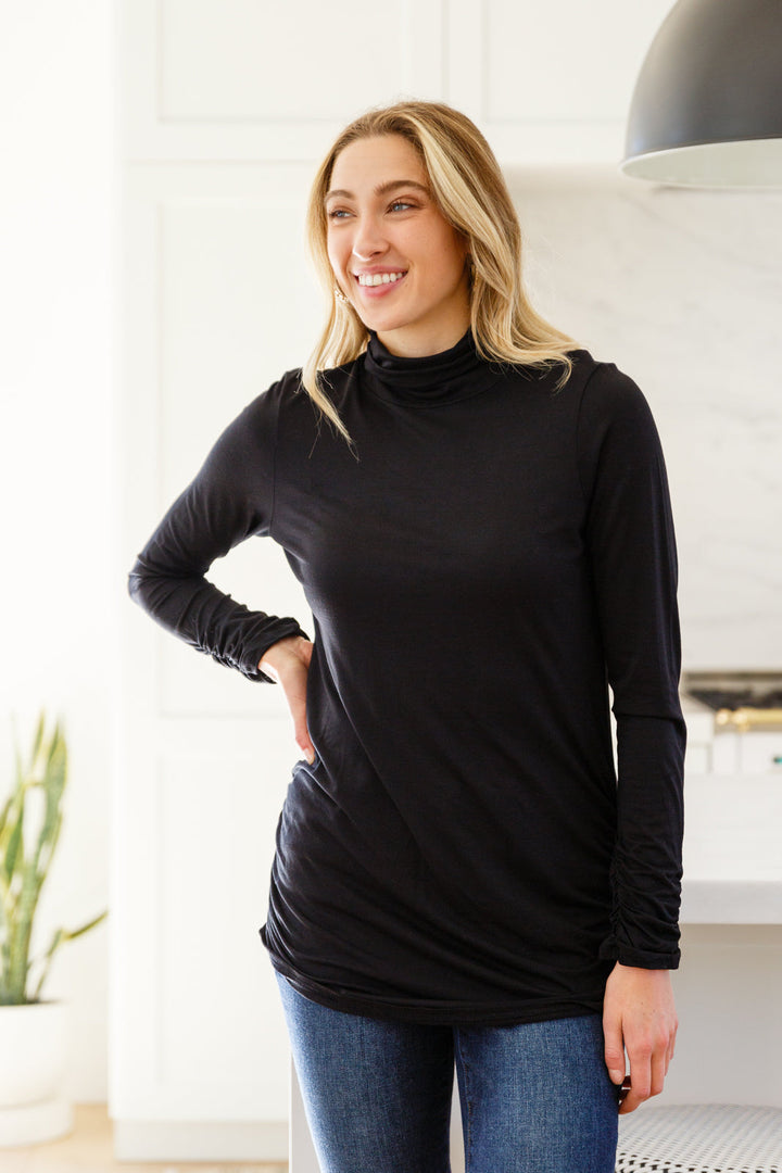 Nivia Draped Turtle Neck Tunic in Black!