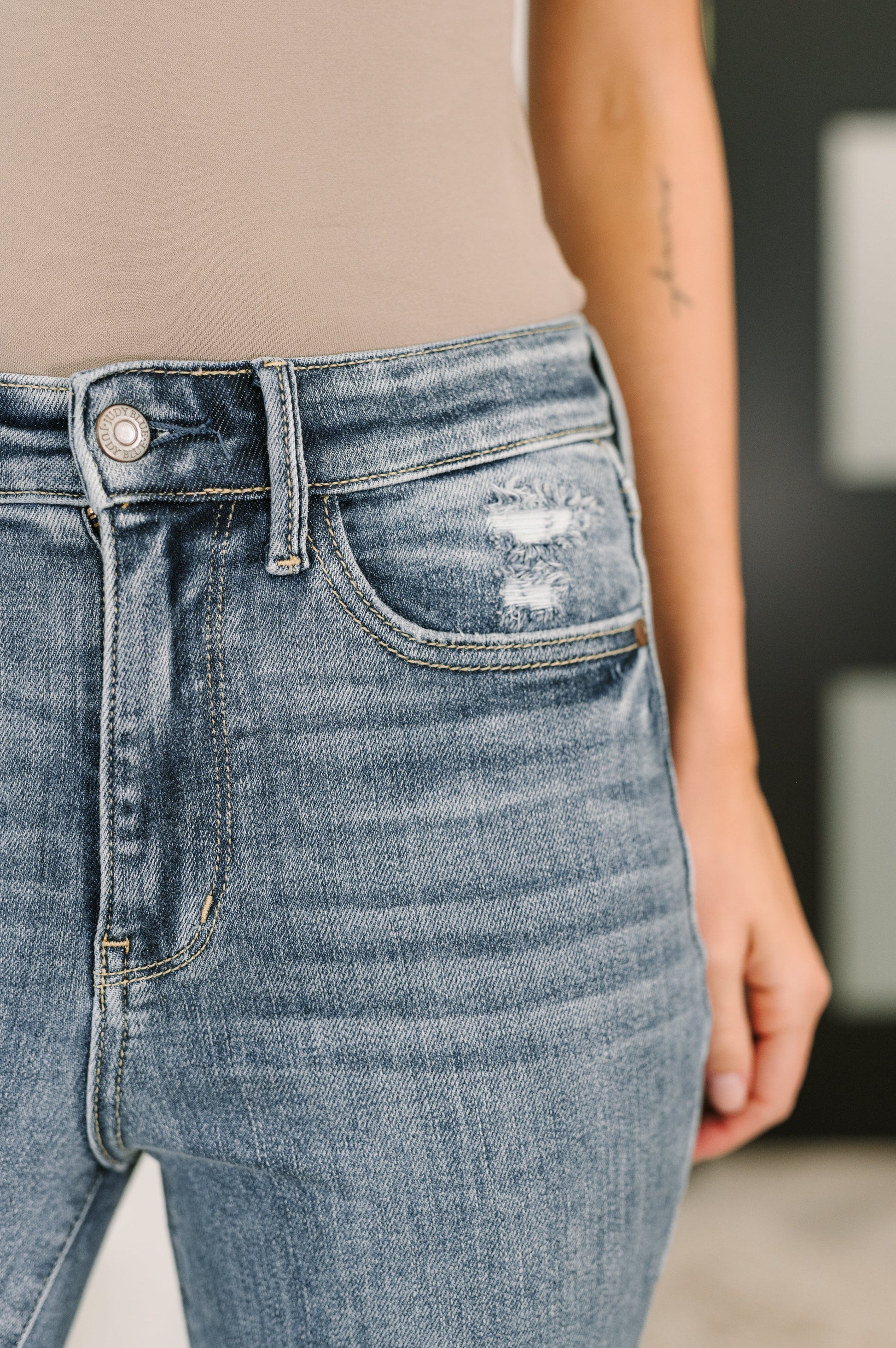 Close-up of blue jeans with a blurred background