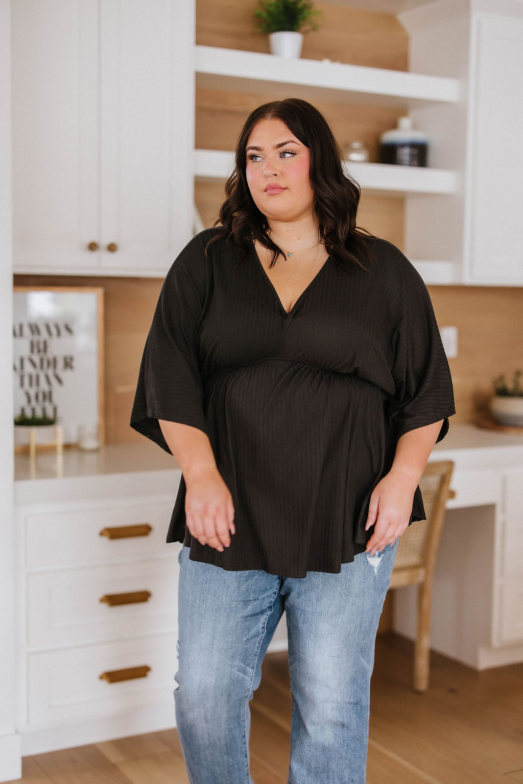 Storied Moments Draped Peplum Top in Black!