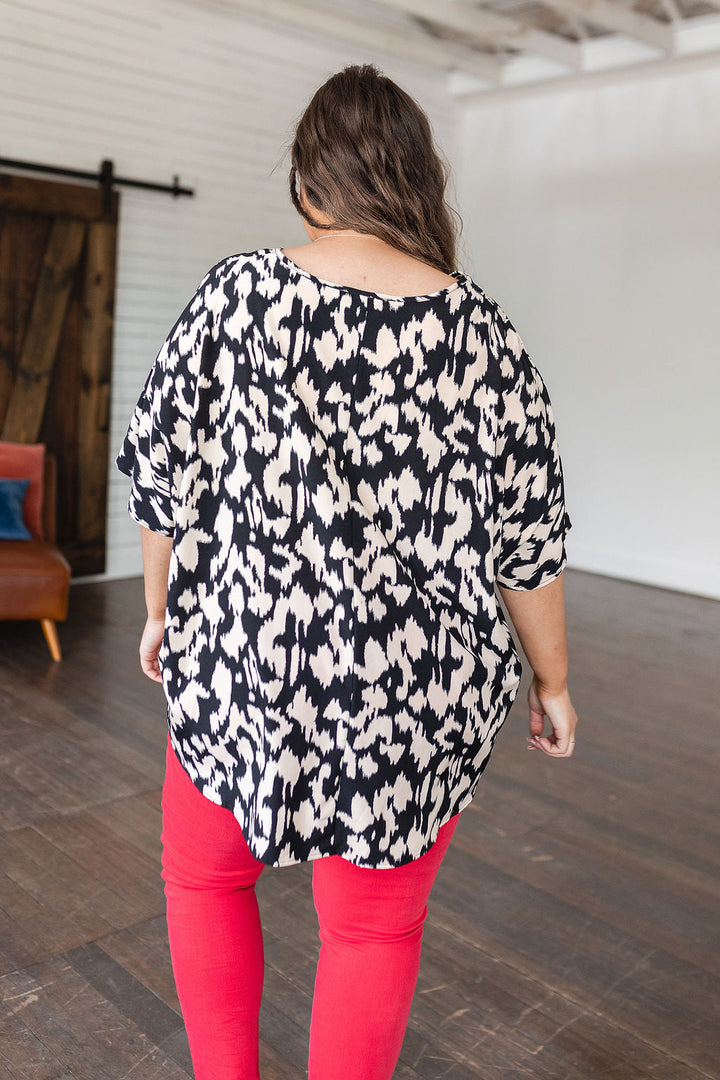 Unforgettable V-Neck Animal Print Blouse in Black!