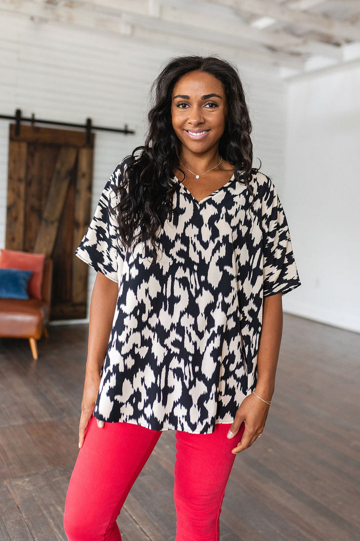 Unforgettable V-Neck Animal Print Blouse in Black!