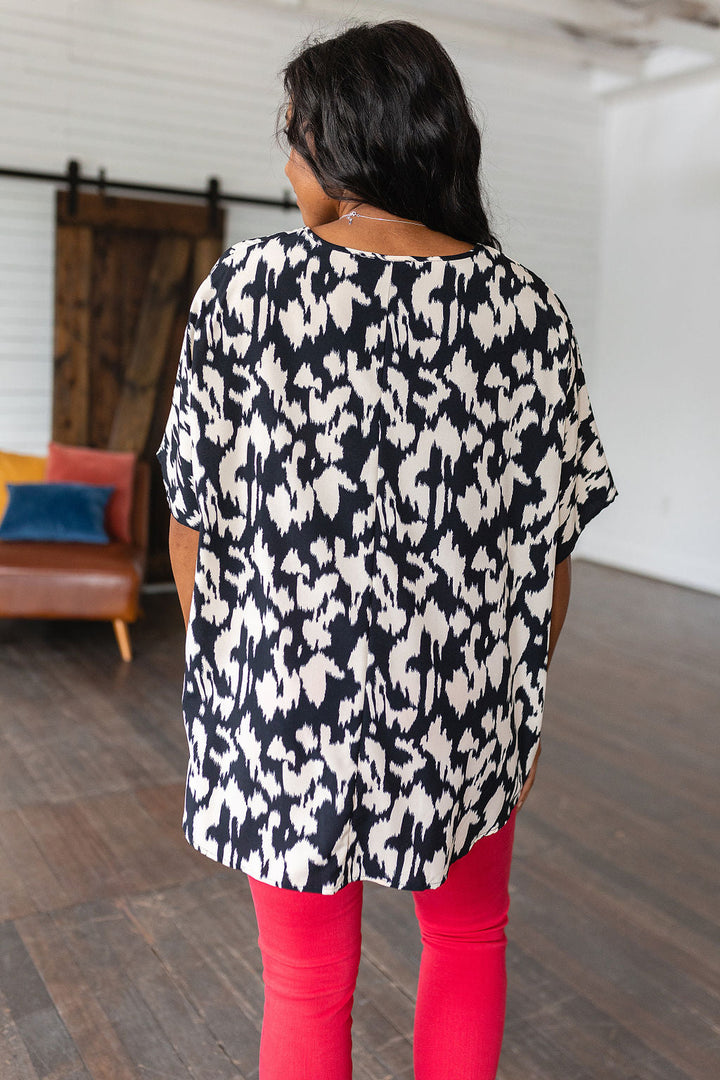 Unforgettable V-Neck Animal Print Blouse in Black!