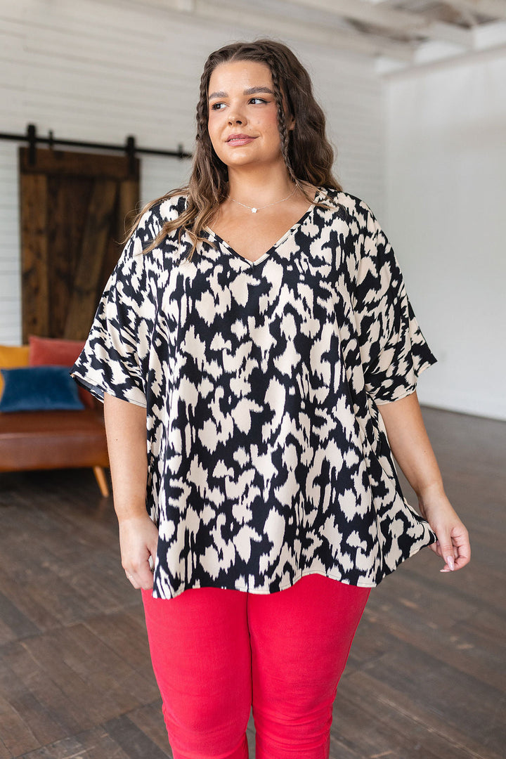 Unforgettable V-Neck Animal Print Blouse in Black!