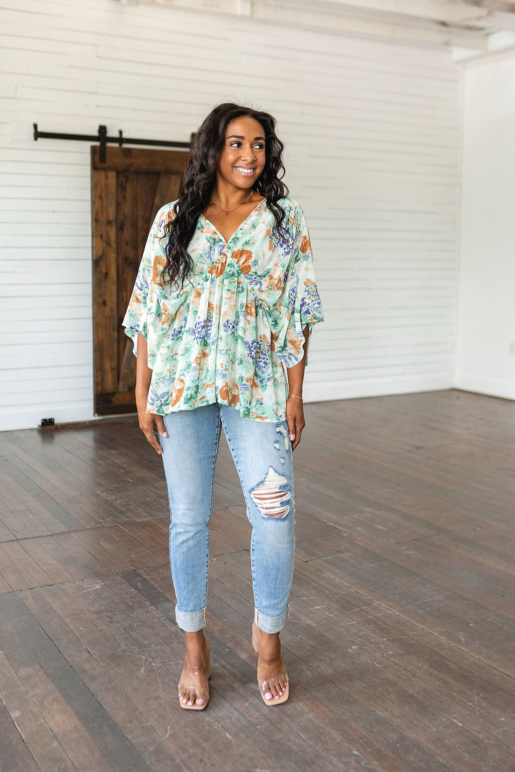 Fabled in Floral Draped Peplum Top